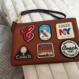 Coach Tan Wristlet with Vintage Patches